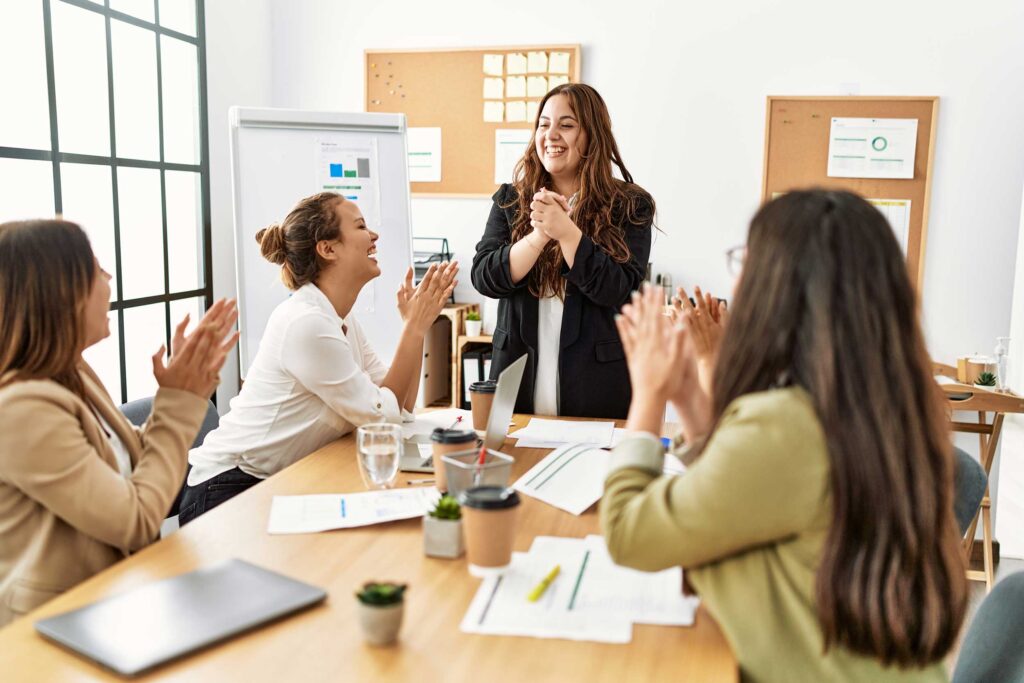 girls-clapping-meeting